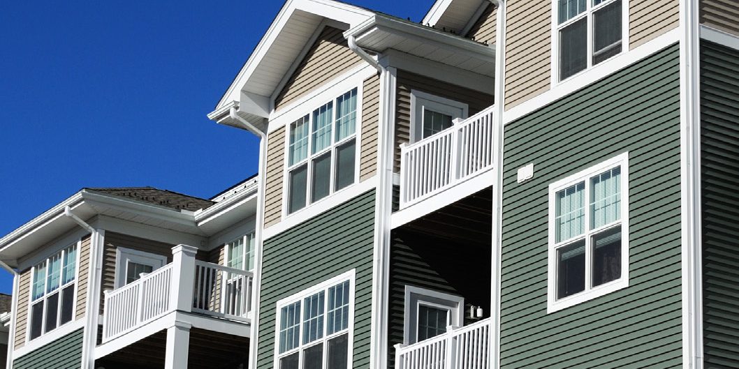 Some newly-built condos on a clear day.