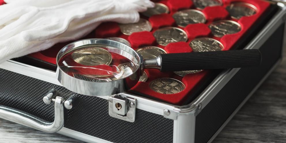 A collection of valuable coins in a briefcase.